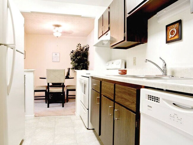 Kitchen with Dishwasher - The Village on Beaver Creek Apartments