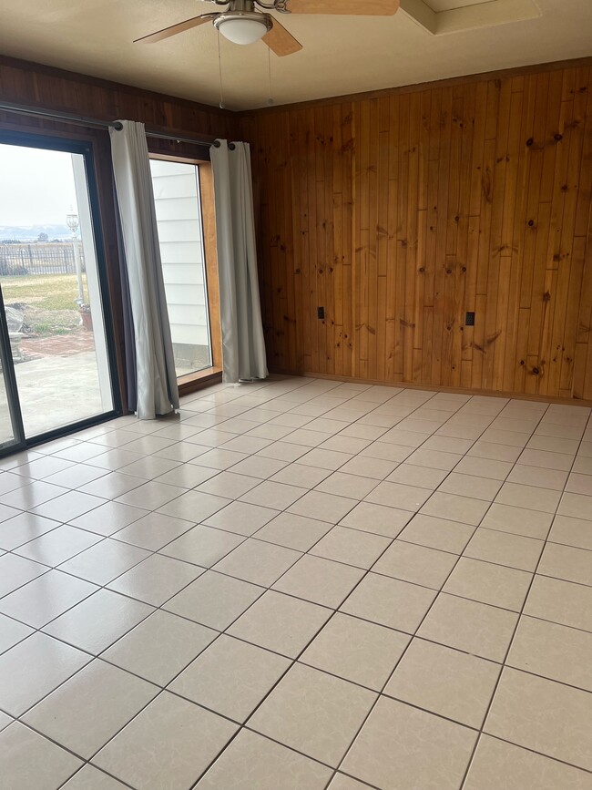 Living room has tile floors and great views. - 881 Bishop Rd Unit A