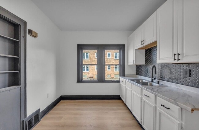 Photo - 3447 E 140th St Unit 1
