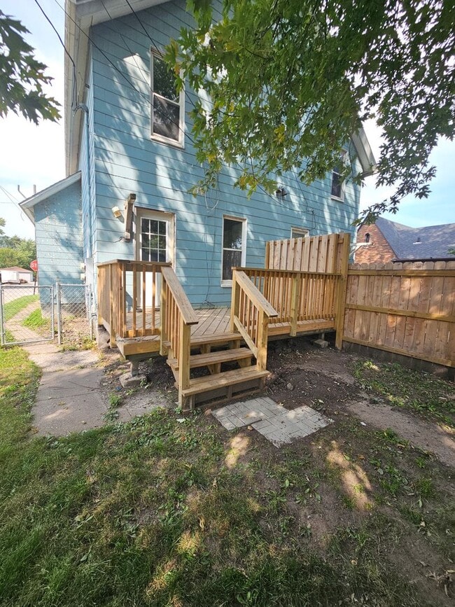 Photo - 1209/1211 W 15th St. NO MAINTENANCE WITHOUT APPROVAL call 563-505-0219 Unit 1211 W 15th St