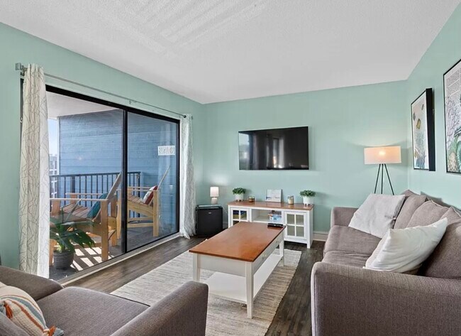 A comfortable living room area to enjoy some TV after a long day. - 5905 S Kings Hwy