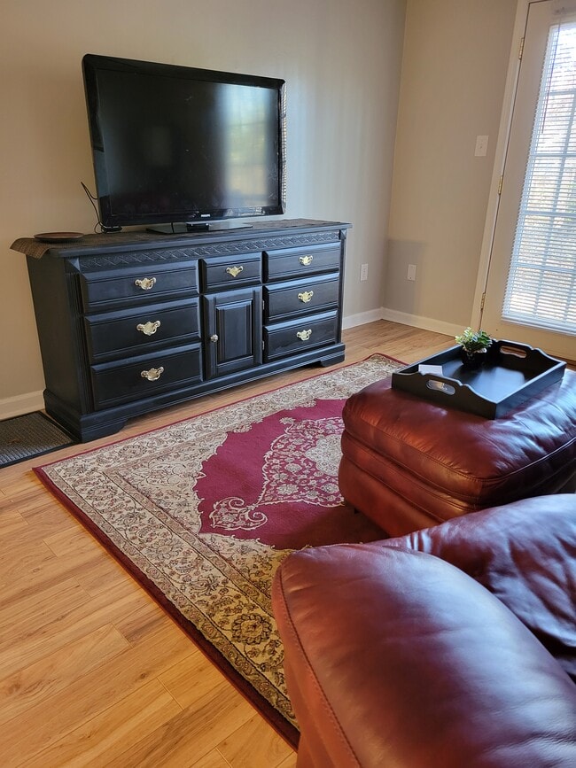 Living Room with french doors to patio. - 435 Haltiwanger Rd Unit 3