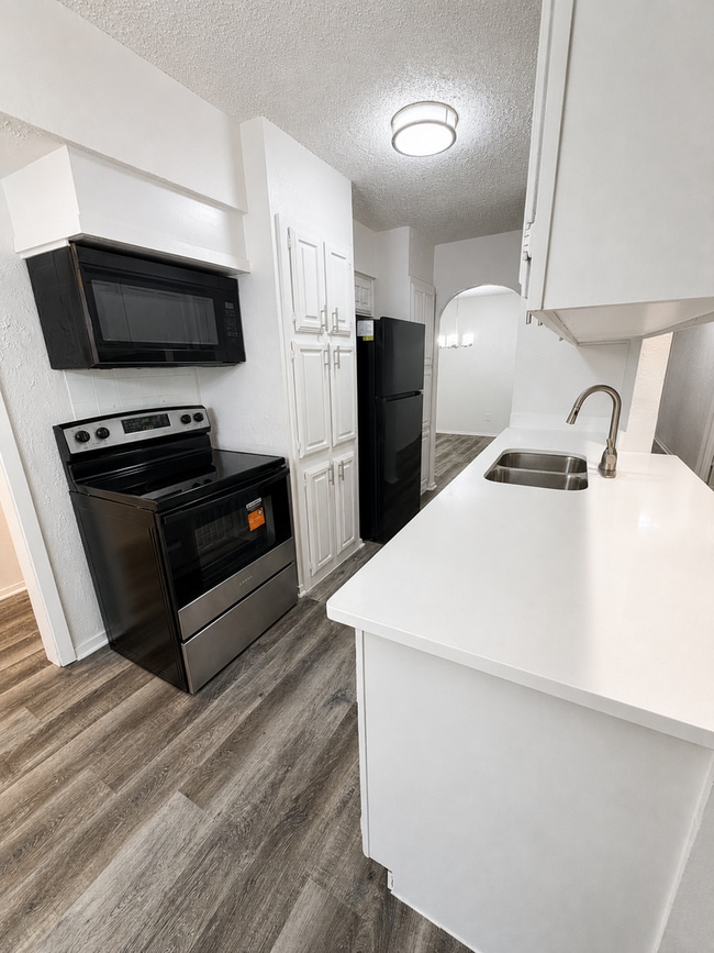 Photo - 3-Bedroom, 2 Bath Single Family for Rent in Arlington, TX | Attached Garage & Modern Kitchen