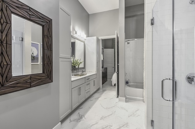 Luxurious bathrooms with walk-in showers and soaking tubs