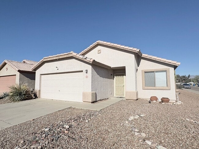 Building Photo - 3 bed/2 bath home on the north west side with garage and fenced yard