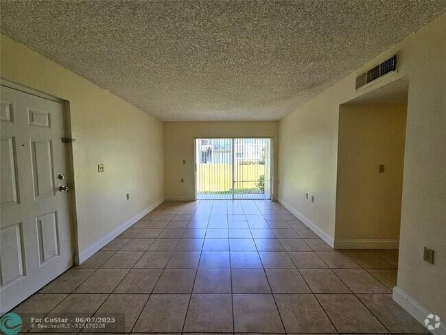 Building Photo - 1215 Benoist Farms Rd Unit 103 Rental