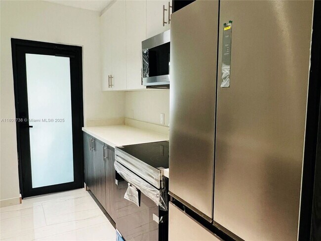 Photo - 1155 102nd St Condo