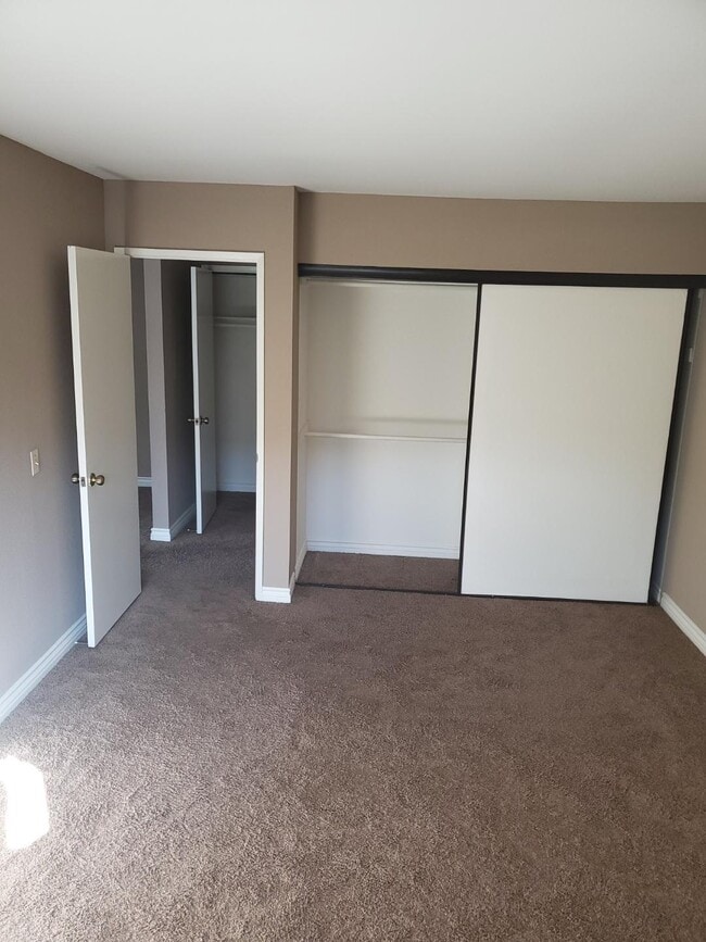 Baywind bedroom with carpet - Bayview Apartments