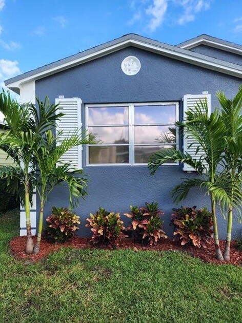 Impact windows and fold out hurricane shutters - 126 S E St