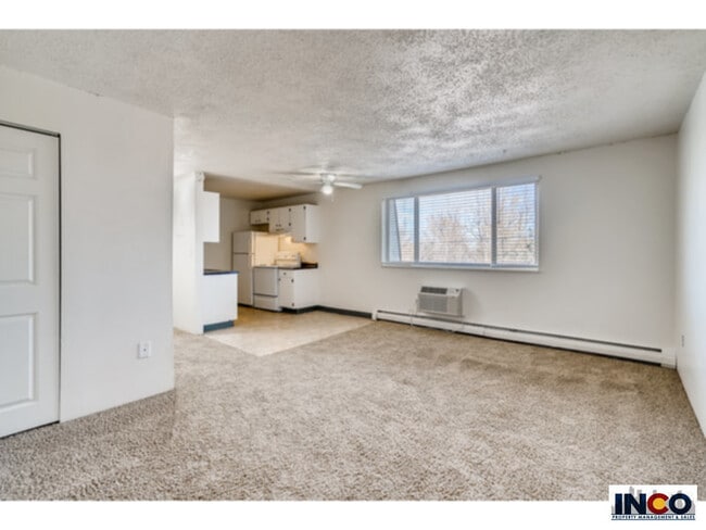 Building Photo - 3680 S Lowell Blvd Unit 101 Rental