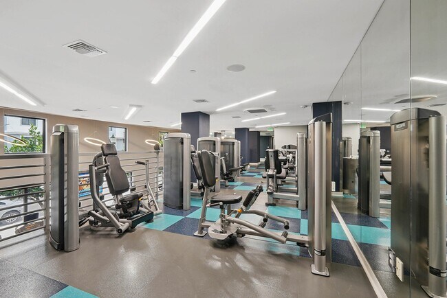 24/7 fitness center with cardio and strength training equipment