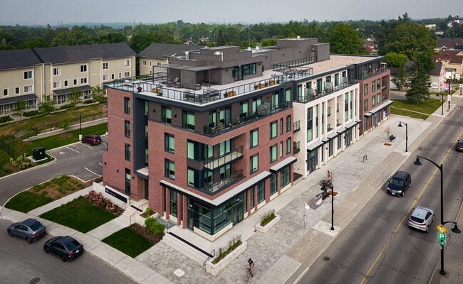 Building Photo - Brand New 1 Bed + Den Unit 404