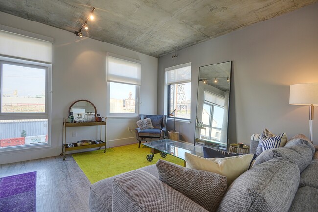 Luxe living room with plenty of natural light - The Gantry
