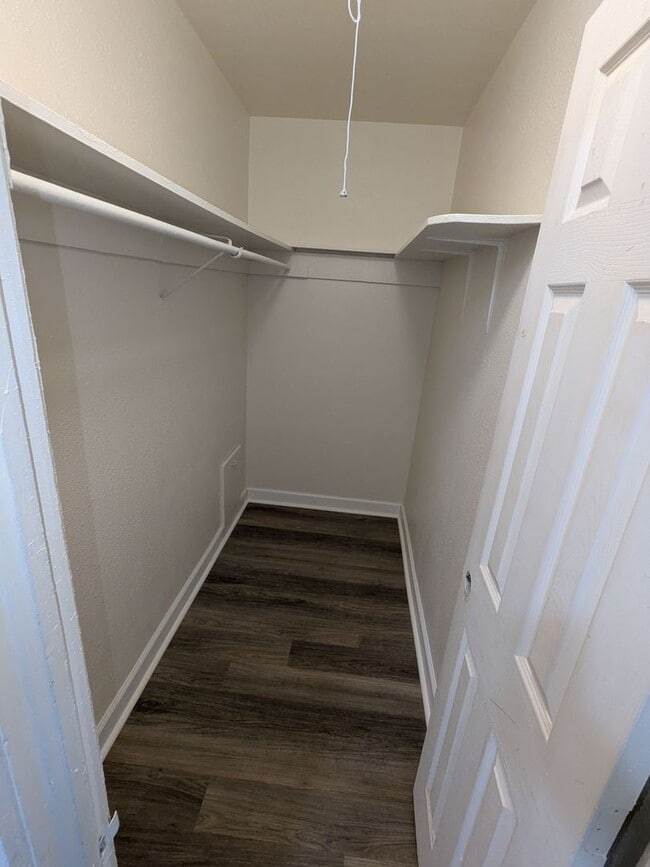 Photo - Ground Level 2 Bedroom, 2 Bath apartment. New flooring and paint. Tenant pays electric and natura...