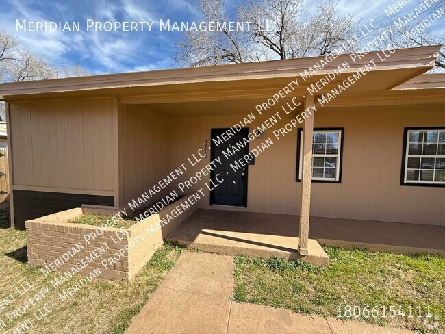 Building Photo - Two bed One bath with backyard Unit A Rental