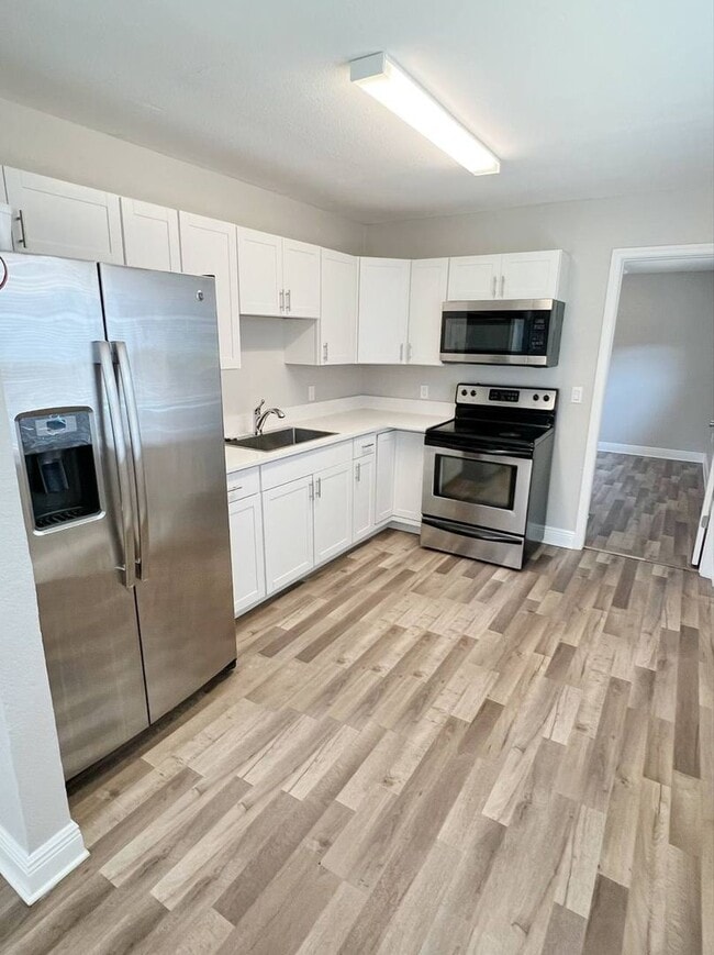 Building Photo - New Remodeled - 3 Bedroom 2 Bath Duplex - 2 Assigned Parking Spaces
