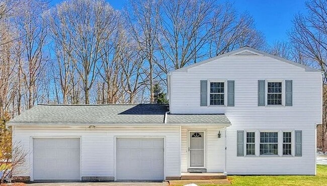 Building Photo - Spacious 4 Bedroom Single-Family Home with Deck & Attached Two-Car Garage