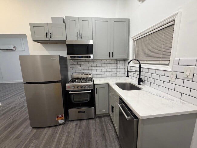 Building Photo - 406 Communipaw Ave Unit 4