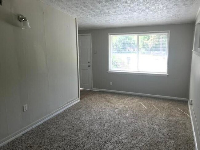 Spacious 4 Bedroom Home With Garage And Modern Updates