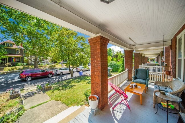 Photo - Charming 5-Bedroom Home with Exposed Brick...