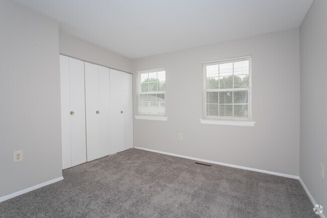 Townhouse - 2 BR, 1 BA - 906 Sq. Ft.