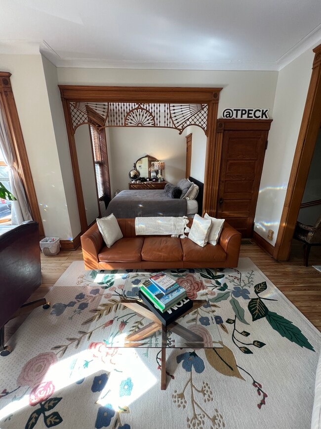 Front living room with extra sitting room that can be used as third bedroom, reading room, or office - 938 W Newport Ave