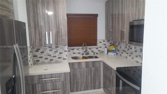 Building Photo - 310 Fontainebleau Blvd Unit 203