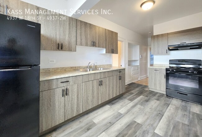 Building Photo - 4937 W 18th St Unit 4937-2W