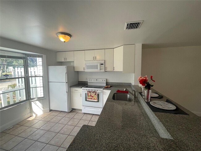 Photo - 23 SW 3rd St Townhome