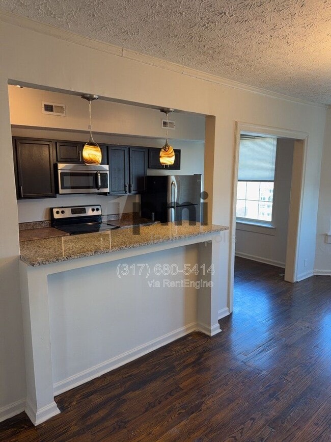 Photo - 1 W 28th St Unidad 703