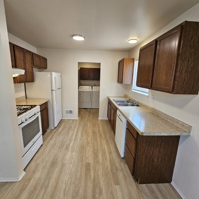 Photo - 3 Bedroom, 1 Bathroom Ranch with Updated Flooring, Paint, Carpet. 2 Car Garage. Kitchen with All ...