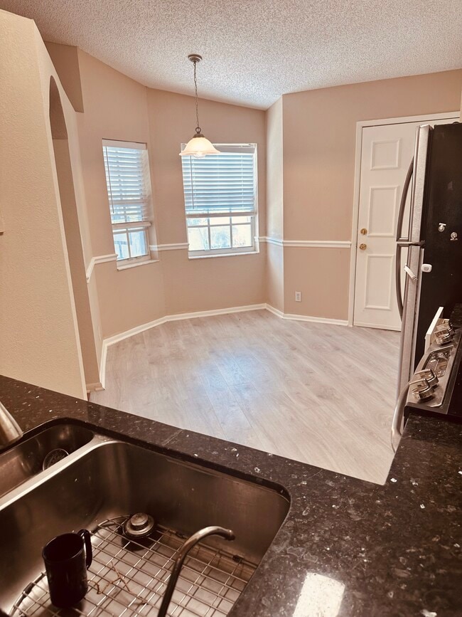 Kitchen - Reverse view - 8108 Summer Shores Dr