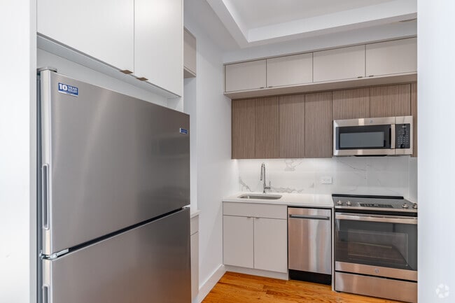 2BR, 1BR - 605SF - Kitchen