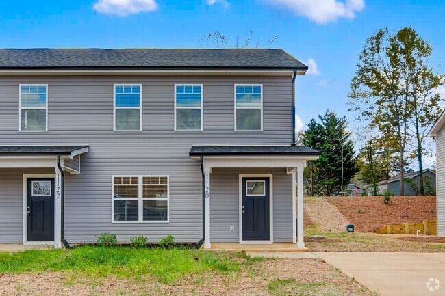 Building Photo - Prime Location! 3BR Townhome with 2.5 Baths