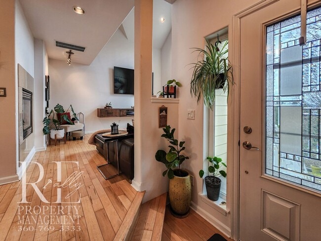 Photo - Light-Filled View Home with Vaulted Ceilings & Warm Wood Finishes