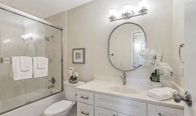 Photo - Spacious 1bdrm living room and bedroom with large picture windows bringing in lots of natural light.