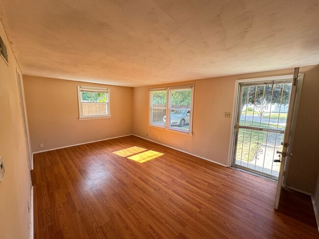 Building Photo - Charming 2-Bedroom, 1-Bathroom Home – $1,2...