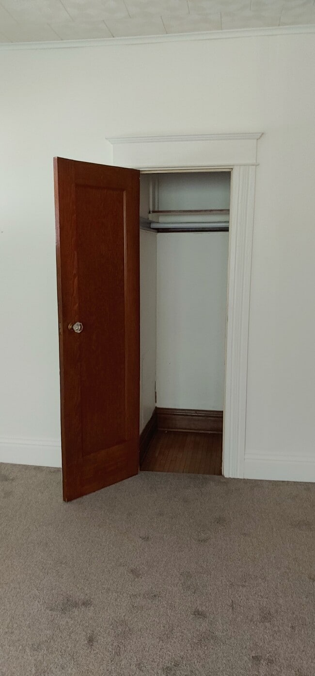 Coat closet at end of livin room. - 2504 Chili Ave Unit 2