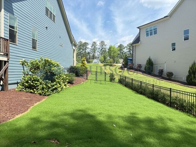 Photo - Beautiful 3-Bedroom Home with Loft, Screened Deck & Fenced Backyard – Convenient to Duke Univers...