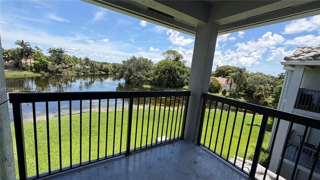 Building Photo - 11225 W Atlantic Blvd Unit 304