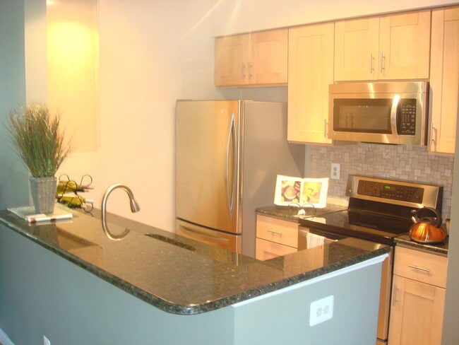 Kitchen and granite countertop - 5917 Barbados Pl Unit 103