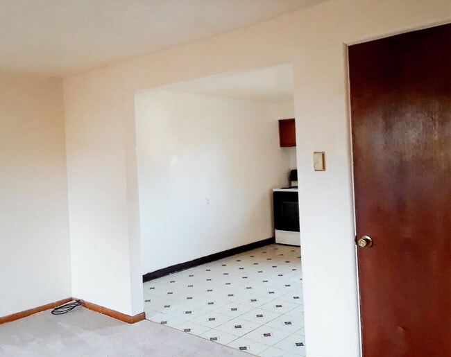 Livingroom view into kitchen - 111 1st Ave W