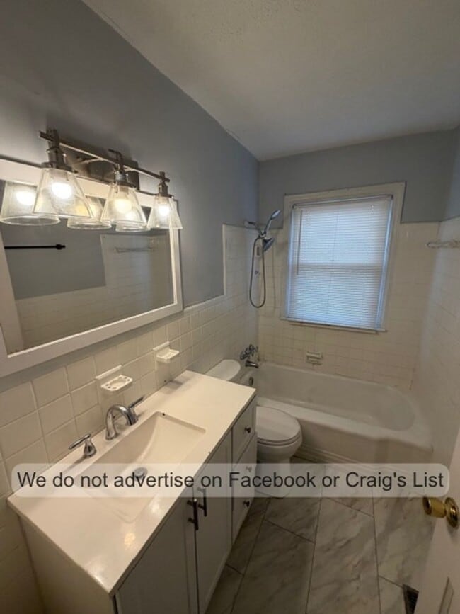 Photo - Blake Street &amp; Facility Drive Duplex Unidad Facility Drive 110