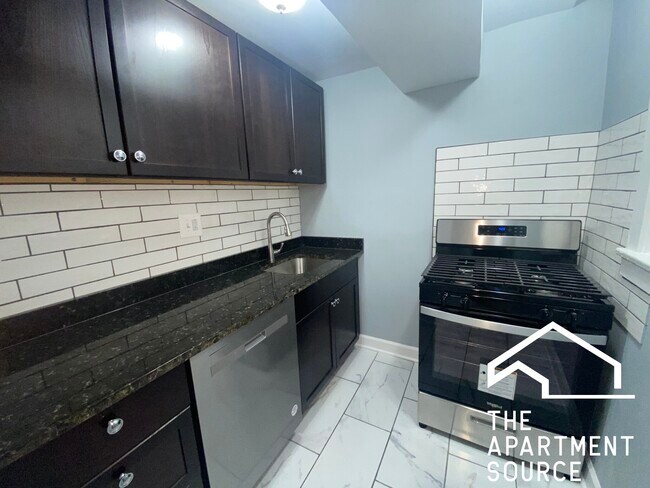 Building Photo - 5664 N Ridge Ave Unit BASEMENT Rental