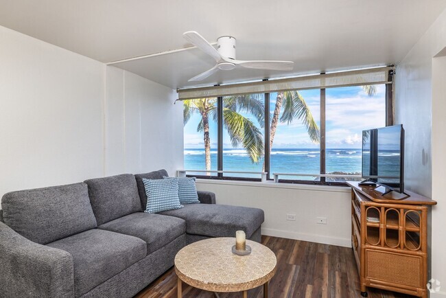 Building Photo - BEACH FRONT FURNISHED CONDO - 2/2/1cov pkg