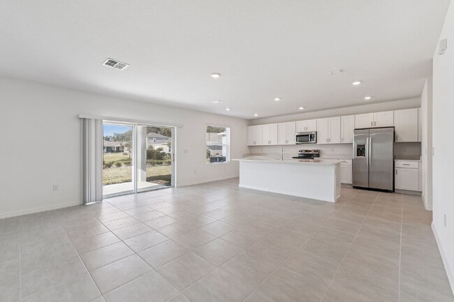 Photo - Spacious 5 Bedroom with 3 Baths + Bonus & 2,673 Sq Ft of Comfort in Edgewater, FL!