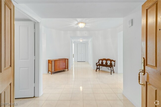 Building Photo - 7515 Pelican Bay Blvd Unit 2A Rental