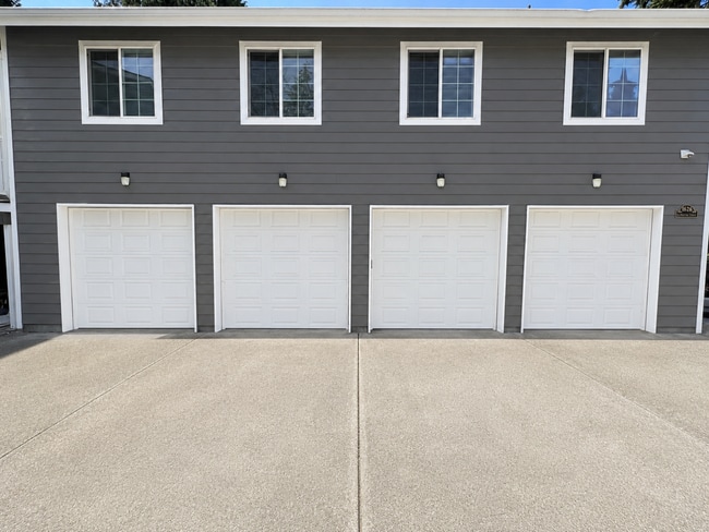 Photo - Elevated 3-Bedroom Home with Secure Garage & Cozy Living Space Unit C