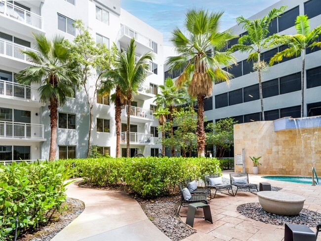 A landscaped courtyard at the center, kept up by the on-site team.