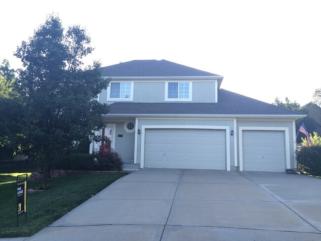 Photo - {7301} Quiet Cul-de-sac + Three Car Garage + Updated Kitchen + Finished Basement + Bedroom Level ...